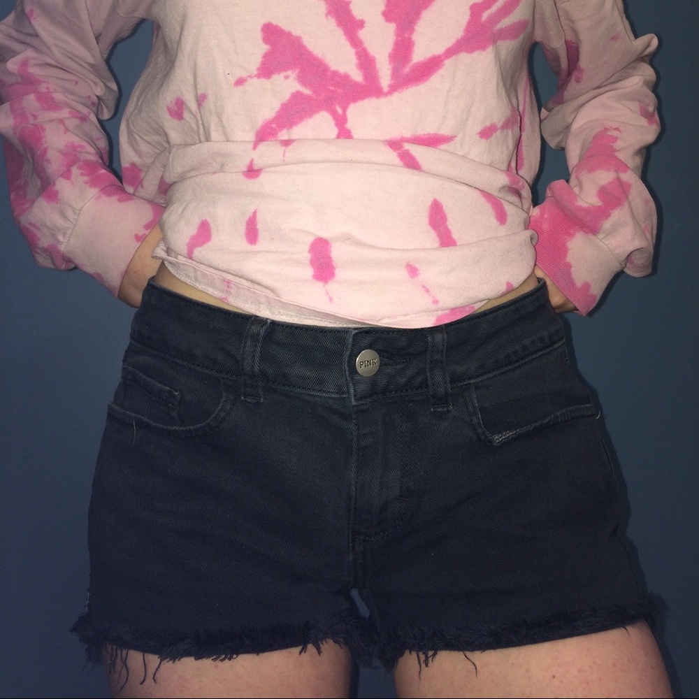 Black low rise jean shorts.